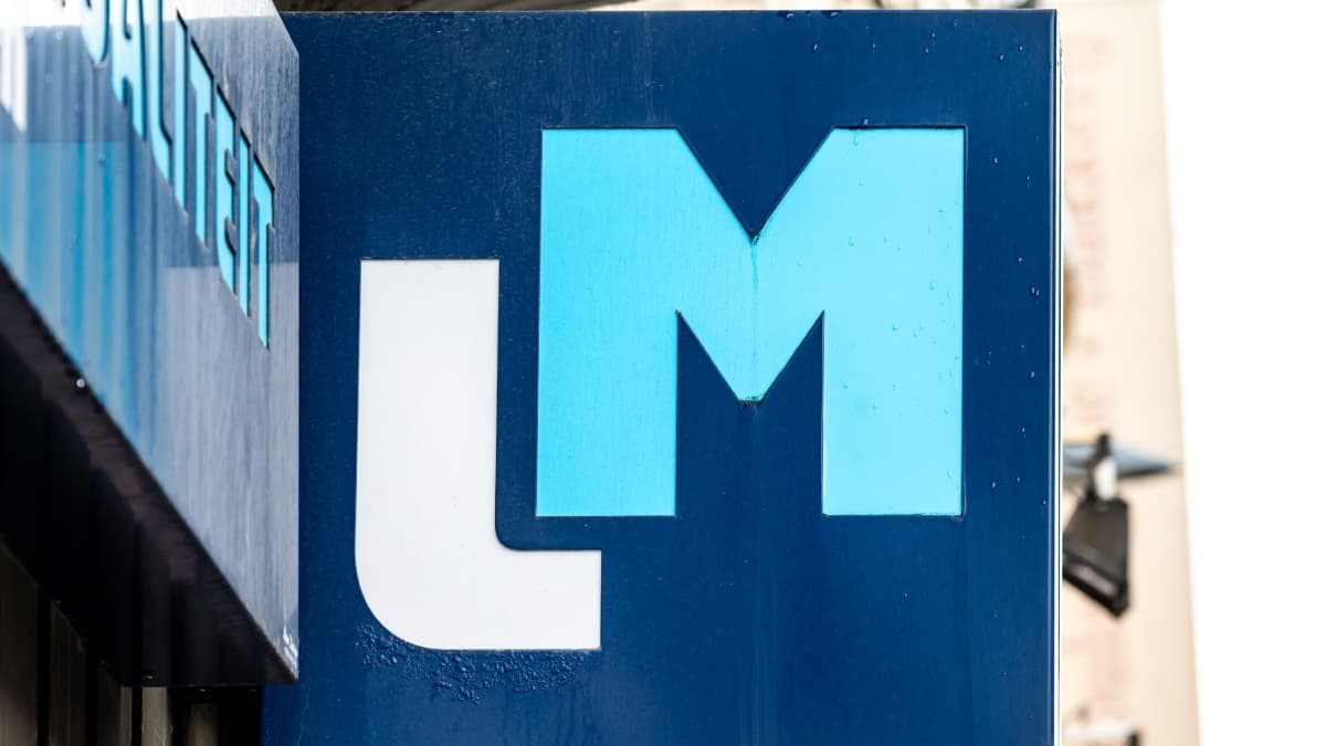 Logo Mutualité Libérale sur un bâtiment à Bruxelles.